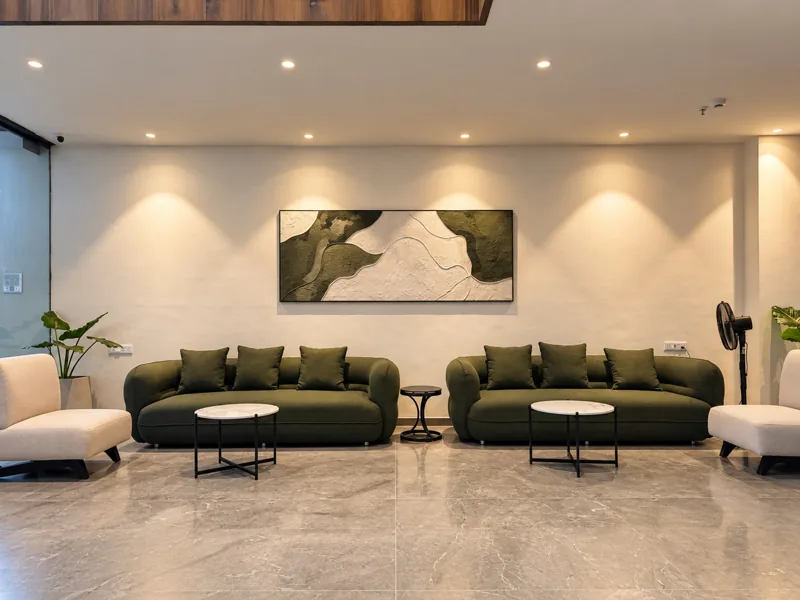 Lobby lounge seating at Amāra Hotel, Nizamabad