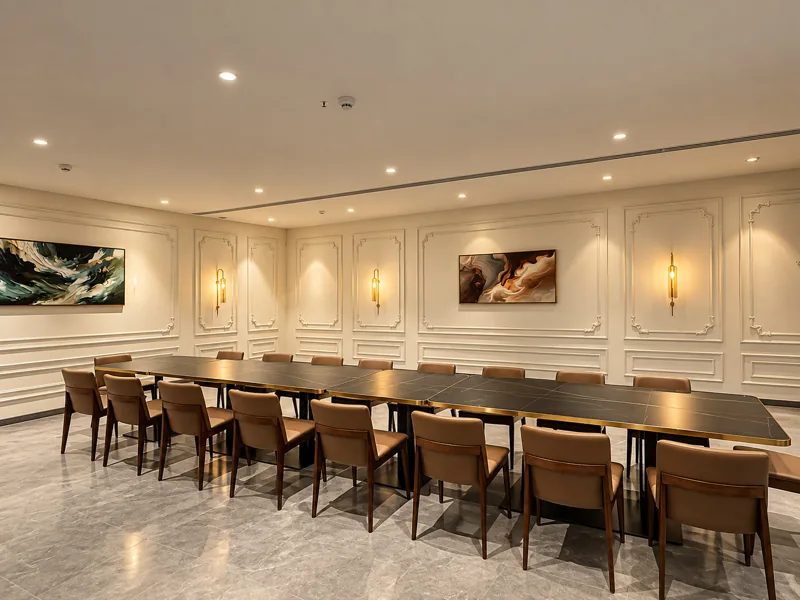 Meeting room with boardroom table at Amāra Hotel, Nizamabad